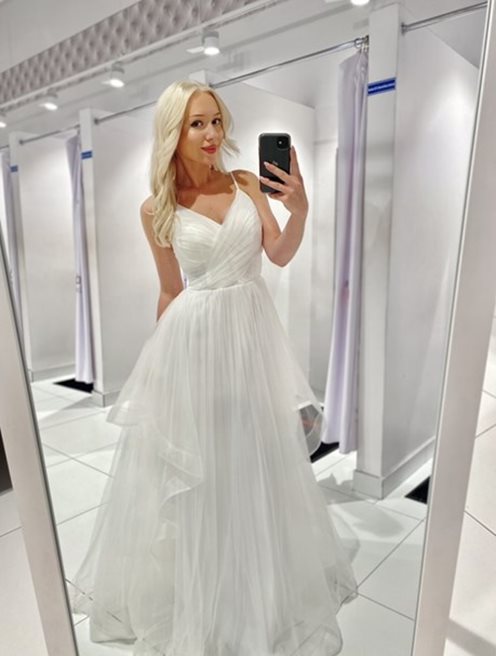 Długa sukienka na ramiączkach dół falbany biel